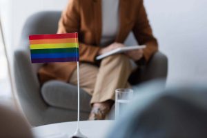Image of pride flag in the office of an LGBTQ therapist in Chapel Hill, NC. Shwoing what you can expect from gender affirming therapy or LGBTQIA affirmative therapy. There is support available with LGBTQIA therapy in North Carolina.