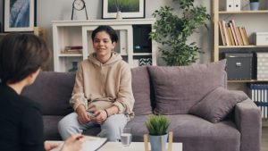 Teen participating in DBT-informed therapy in Durham NC to build emotional regulation, mindfulness, distress tolerance, and communication skills in an LGBTQIA+ affirming and neurodivergent-affirming therapy practice.