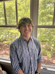 Professional headshot of Brice Bradshaw, LCMHC, a Durham NC therapist specializing in DBT-informed therapy, ADHD coaching, career counseling, couples therapy, family therapy, and individual counseling for children, adolescents, and adults.
